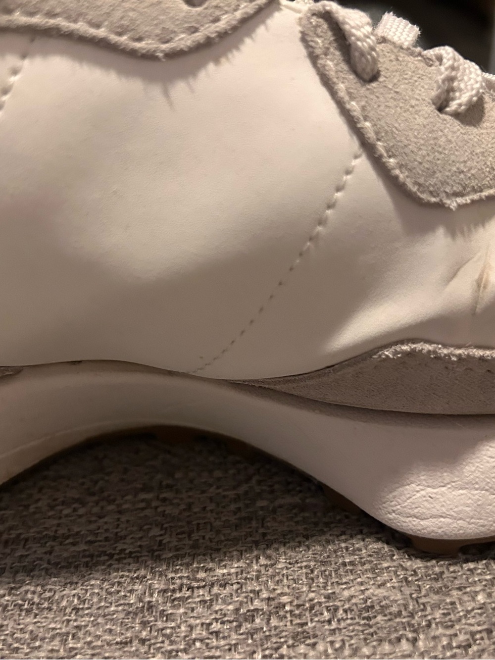 New Balance White and Black Low-Top Sneakers - Picture 2 of 9